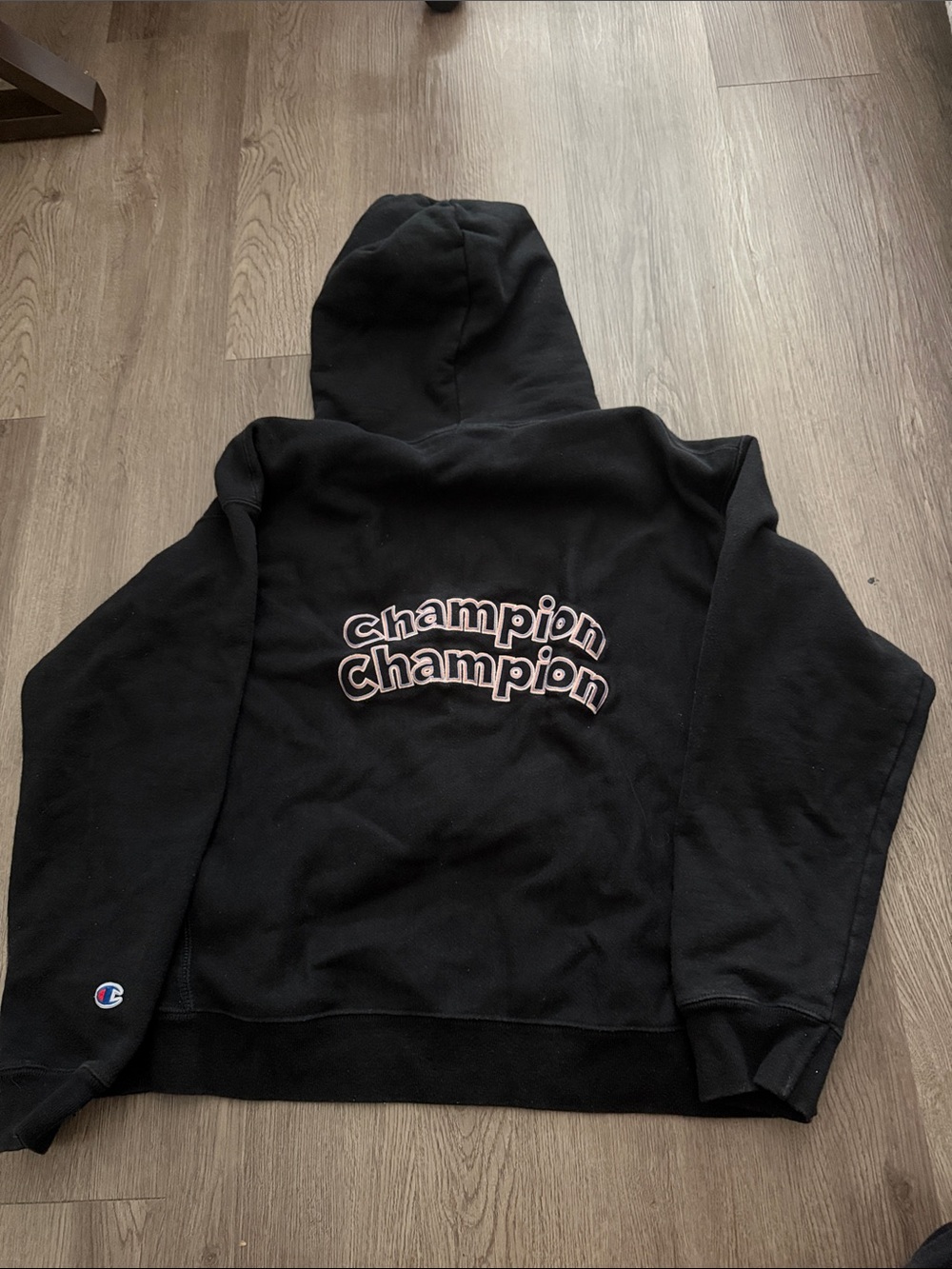 Champion Black Hoodie with Pink-Outlined Logo